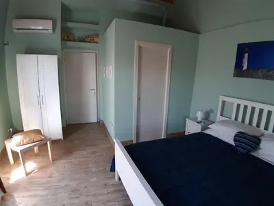 Letto o letti in una camera di L.T. METIS