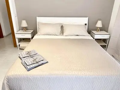 Letto o letti in una camera di Charming Apartment in Catania with Balcony and City View