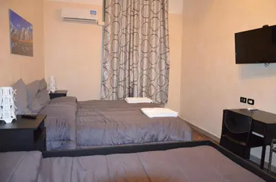 Letto o letti in una camera di Bed&Breakfast Villa Bellini