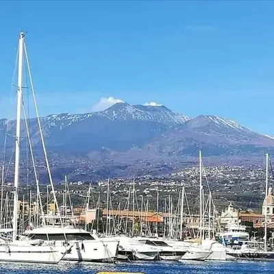 Magic Etna and glamorous blue sea