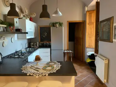 Cucina o angolo cottura di Casa Gino Petrulli Etna, villa con piscina