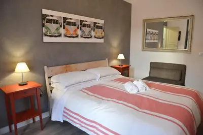 Letto o letti in una camera di Residenza Del Turista