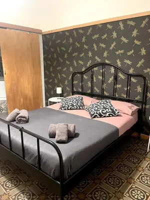 Letto o letti in una camera di CASA STESICORO
