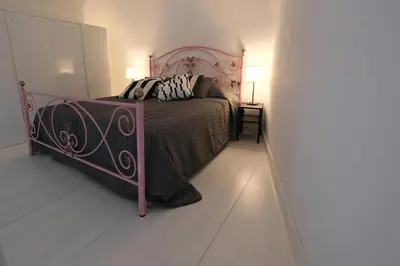 Letto o letti in una camera di a casa del reuccio