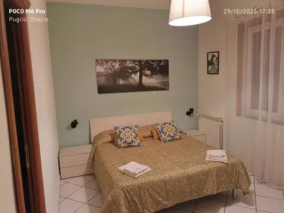 Letto o letti in una camera di I capricci dell' Etna suite