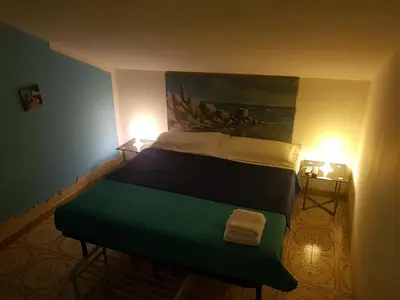 Letto o letti in una camera di Borgo Marinaro