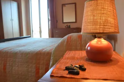 Letto o letti in una camera di B&B Terra Niura