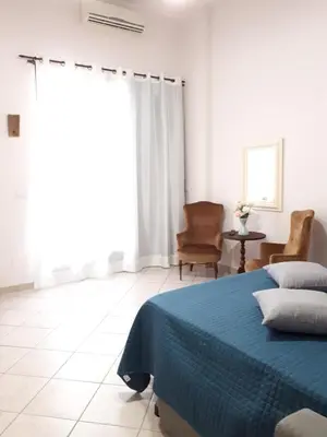 Letto o letti in una camera di Casa Mia Miniapartment