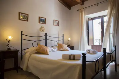 Letto o letti in una camera di Casa al Centro Storico