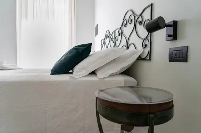 Letto o letti in una camera di FANNY B&B