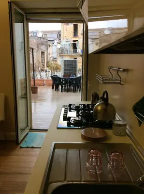 Cucina o angolo cottura di Spacious Apartment in Catania, terrace & city view