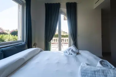 Letto o letti in una camera di CasaVostra al Parco