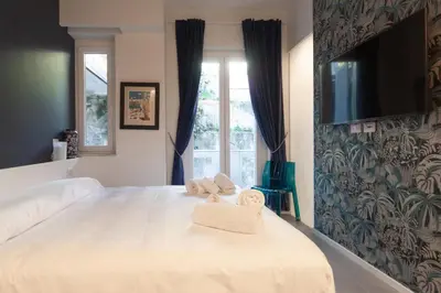 Letto o letti in una camera di CasaVostra al Parco