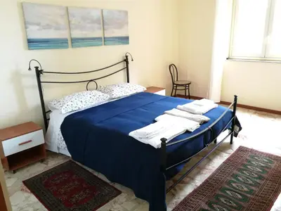 Letto o letti in una camera di Casa Levante Sea View Apartment