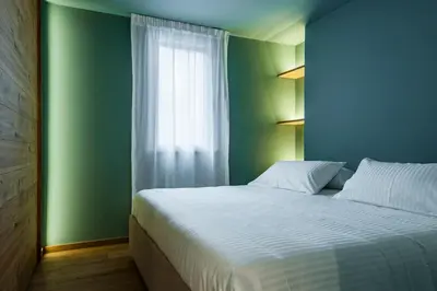 Letto o letti in una camera di Ferrini Home - Rindone 6