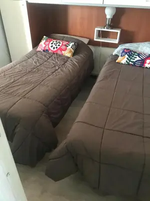Letto o letti in una camera di Residenza Parco Gioeni