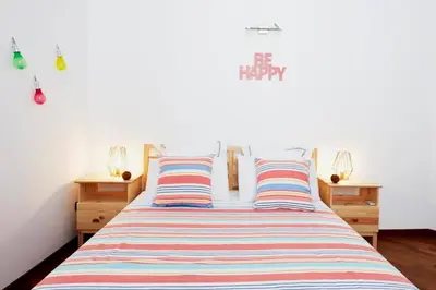 Letto o letti in una camera di iDream Apartment & Rooms