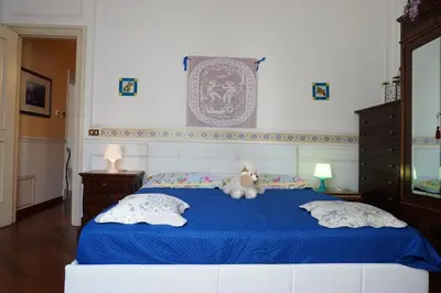 Letto o letti in una camera di Elegante appartamento centro storico