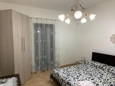 Letto o letti in una camera di Domus Grace
