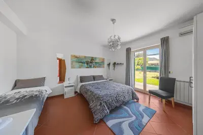 Letto o letti in una camera di PrimeStay