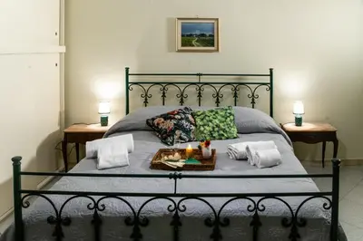Letto o letti in una camera di Santa Caterina da Siena B&B
