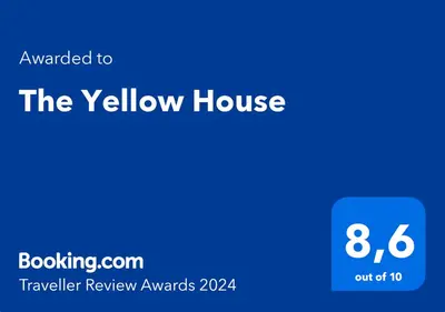 Certificato, attestato, insegna o altro documento esposto da The Yellow House