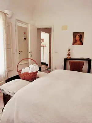Letto o letti in una camera di Fera O' Luni