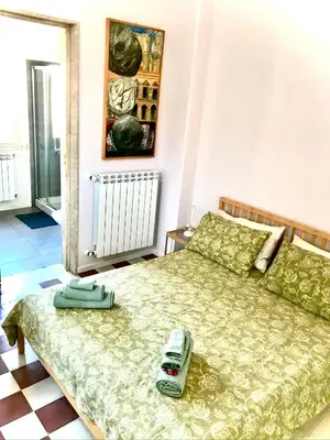Letto o letti in una camera di Il giardino delle zagare - miniappartamento tra Etna e mare