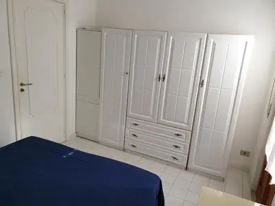 Letto o letti in una camera di Casa Alessia
