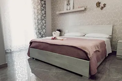 Letto o letti in una camera di La Punta