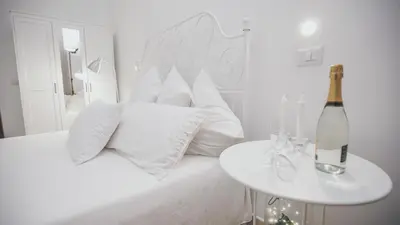 Letto o letti in una camera di Cortile Oliva