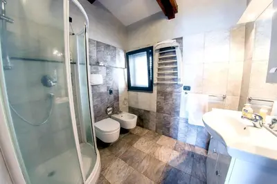 Bagno di Charming apartment in Capo Mulini with sea view - 50 m²
