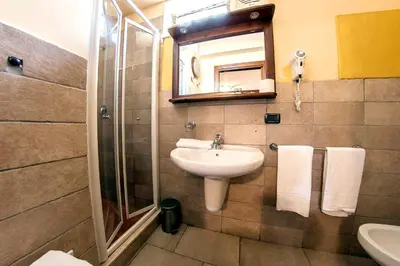 Bagno di Charming house with sea view in Capo Mulini