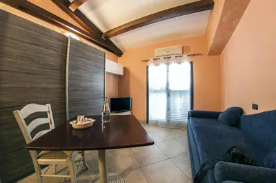 Area soggiorno di Charming house with sea view in Capo Mulini