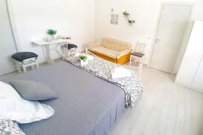 Letto o letti in una camera di Dove nasce il Sole B&B