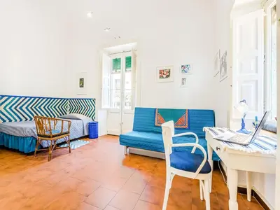 Area soggiorno di Holiday Home in Santa Tecla near Etna Beach
