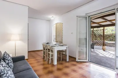 Area soggiorno di Ortensia Apartments by Wonderful Italy