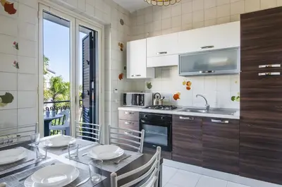 Cucina o angolo cottura di Ortensia Apartments by Wonderful Italy