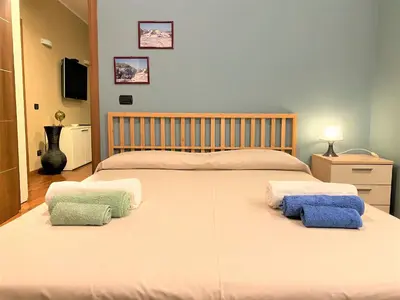 Letto o letti in una camera di Casa Eden