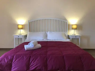 Letto o letti in una camera di Lettera Living Penthouse