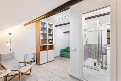 Area soggiorno di GuestHost - Libertà Frame Apartment with Terrace and Etna view