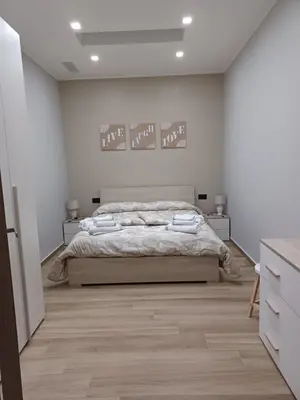 Letto o letti in una camera di Rusina