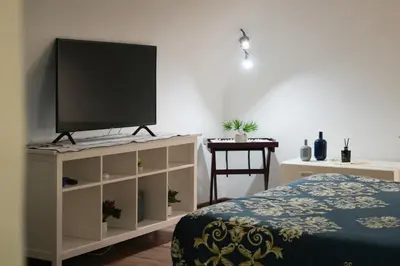 TV o dispositivi per l'intrattenimento presso Filomena Suite Luxury Apartment