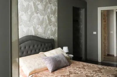 Letto o letti in una camera di Filomena Suite Luxury Apartment