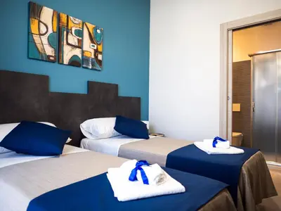 Letto o letti in una camera di B&B Contessa dei venti