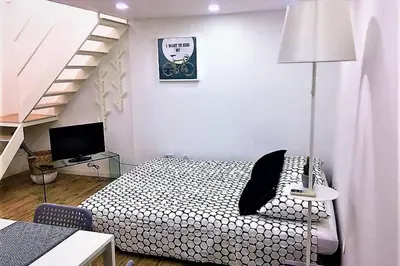 Letto o letti in una camera di Dock78 - MiniLoft in Catania Center