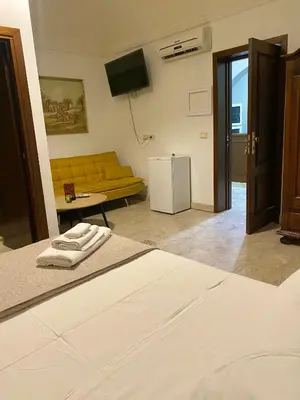 Letto o letti in una camera di Etna Rosso b&b