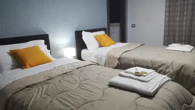 Letto o letti in una camera di Idilliaco inn