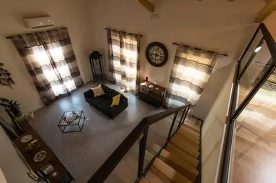 Area soggiorno di Hygge House Catania