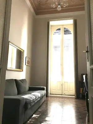 Area soggiorno di Chez Claudia - Relax in Catania city center